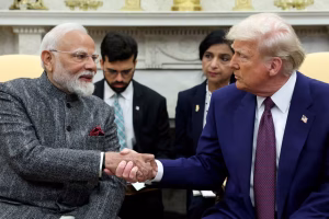 Donald Trump shakes hands with Narendra Modi during a meeting at the White House in Washington, DC, on February 13, 2025.