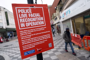 Metropolitan Police officers operating live facial recognition cameras in Croydon town centre