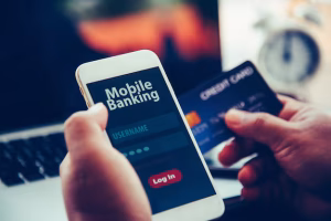 Person using a mobile banking app on a smartphone
