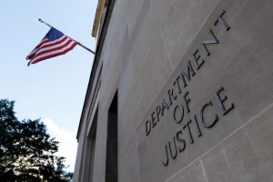 U.S. Department of Justice building in Washington, D.C. with American flag