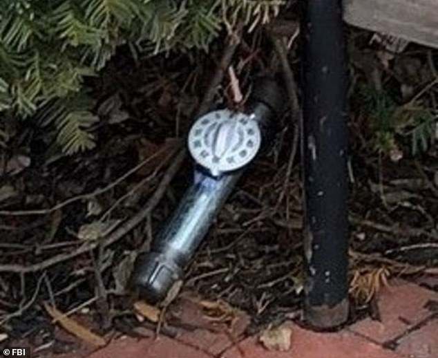 The devices were built using threaded galvanized pipes, kitchen timers and black powder, according to investigators. One of the recovered bombs is shown above.