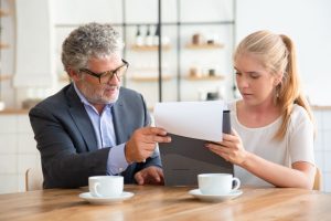 Man and woman reviewing litigation funding