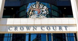 UK Crown Court building exterior showing official court signage