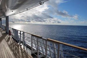 Empty cruise ship deck during a public health response at sea.