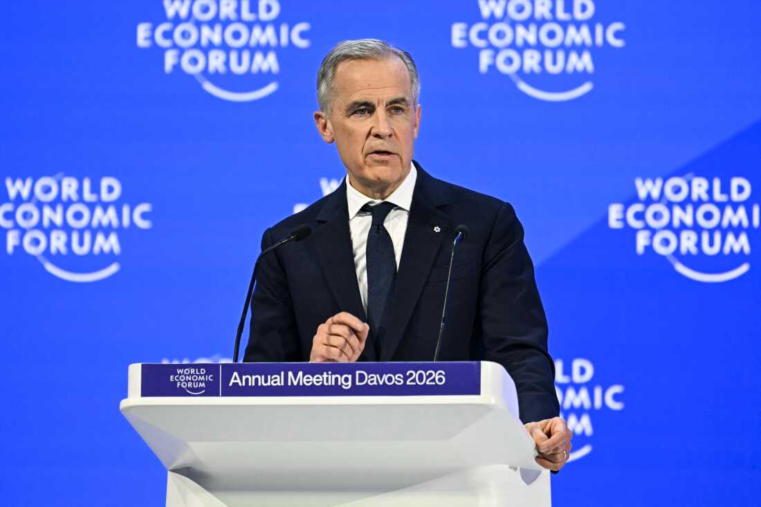 A political leader speaks at a podium during the World Economic Forum Annual Meeting in Davos, 2026.
