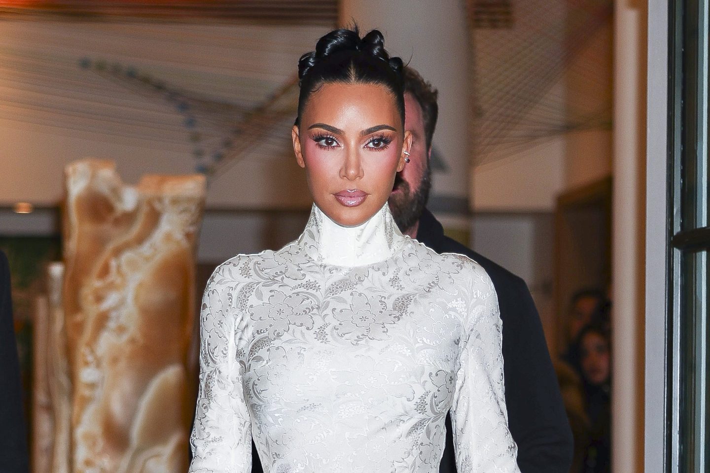Kim Kardashian photographed at a public event, illustrating the challenges public figures face when personal branding intersects with confidentiality obligations
