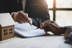 Man signing a will