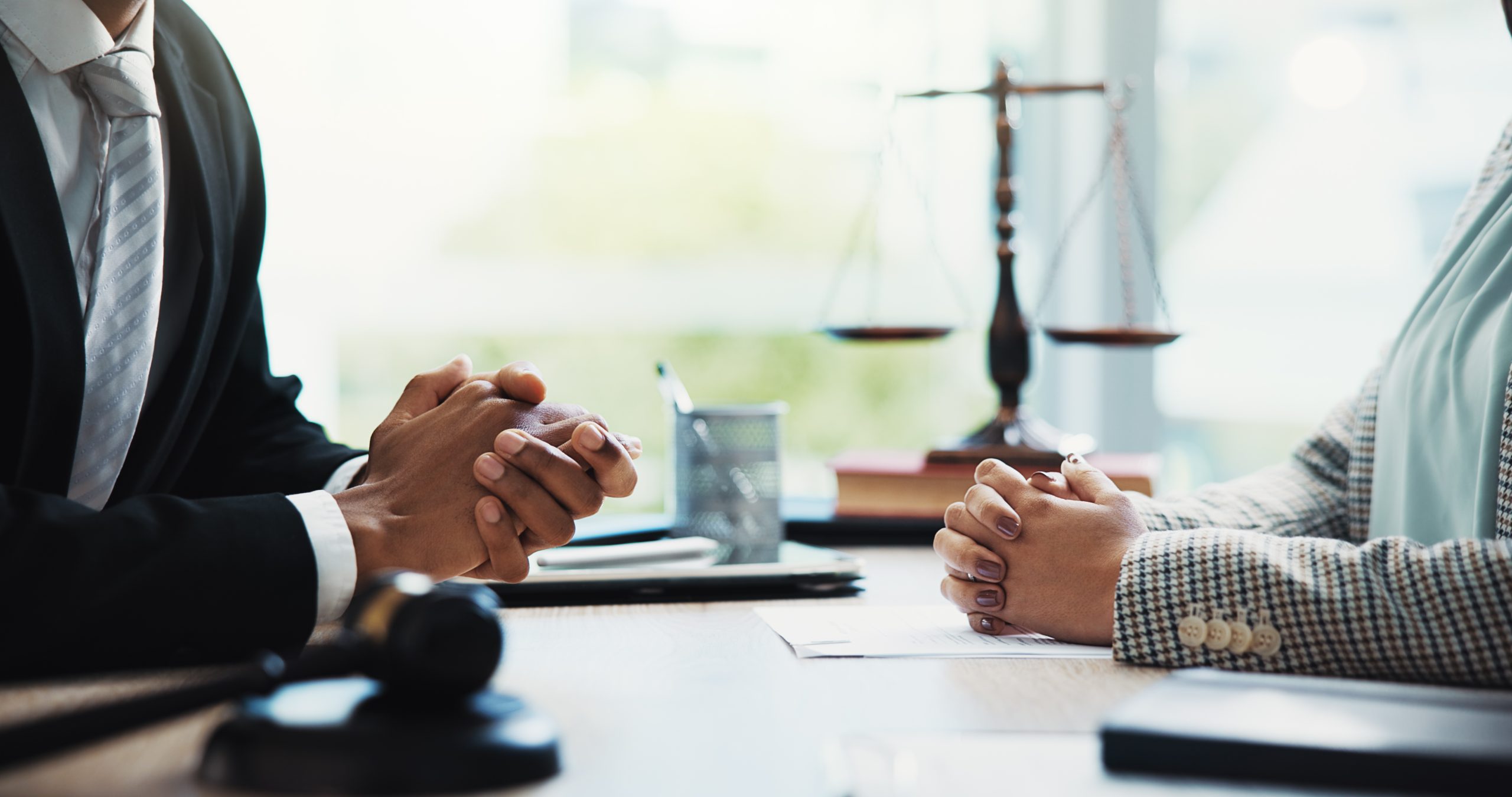 gavel, lawyers and hands of business people in meeting for legal consultation, contract and discussion. corporate, professional and workers in office for legislation, agreement and deal at law firm