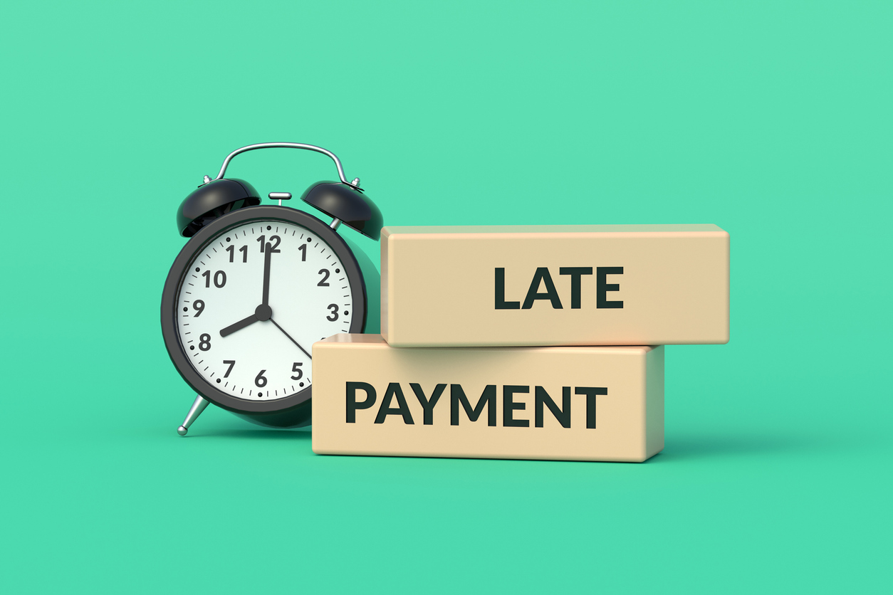 late payment words on blocks near alarm clock. financial concept. final notice. 3d render