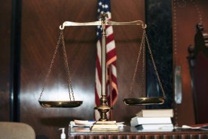 justice scale and flag