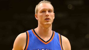 Kyle Singler wearing an Oklahoma City Thunder jersey during an NBA game