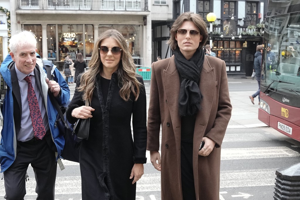 Elizabeth Hurley arriving in court this morning with her son Damian