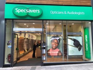 Optician storefront where compulsory eyesight tests are carried out