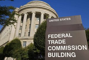A neutral exterior shot of the Federal Trade Commission building, or a modern law firm office exterior (no branding).
