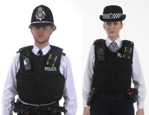 Metropolitan Police uniform and badge symbolizing accountability in UK criminal sentencing
