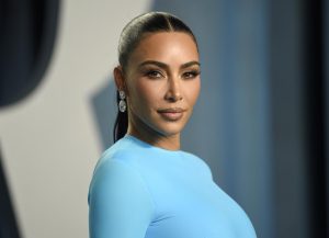 Kim Kardashian attends a Los Angeles event wearing a sky-blue gown and diamond earrings as she continues her law studies and filming projects.