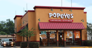 Exterior of a Popeyes Louisiana Kitchen restaurant operated by a U.S. franchisee